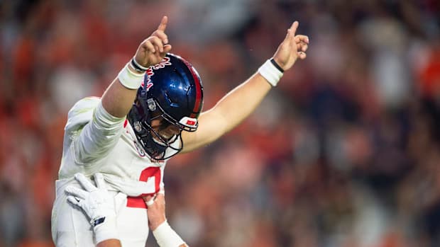 Mississippi Rebels quarterback Jaxson Dart (2) celebrates his touchdown run as Auburn Tigers take on Mississippi Rebels at Jordan-Hare Stadium in Auburn, Ala., on Saturday, Oct. 21, 2023.